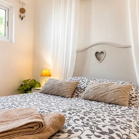 L Instant Cosy * Garons